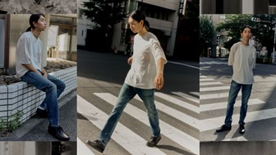 man standing on street in tshirt and jeans