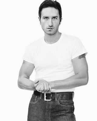 Image of man wearing shirt and pants