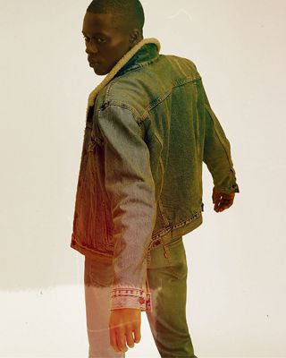 Man wearing jean jacket