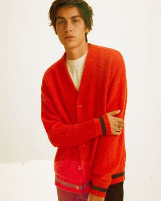 Man wearing yellow hoodie