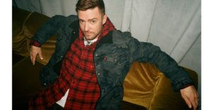 justin timberlake wearing denim jacket and plaid shirt