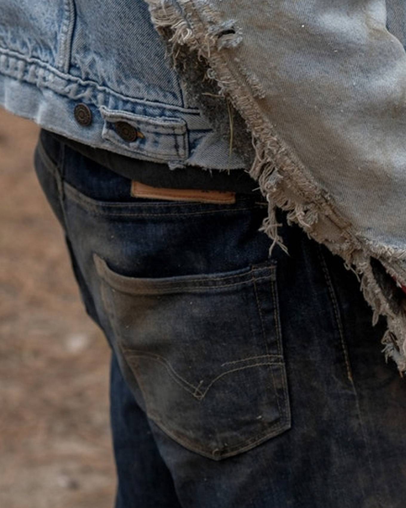 Back of denim jeans.