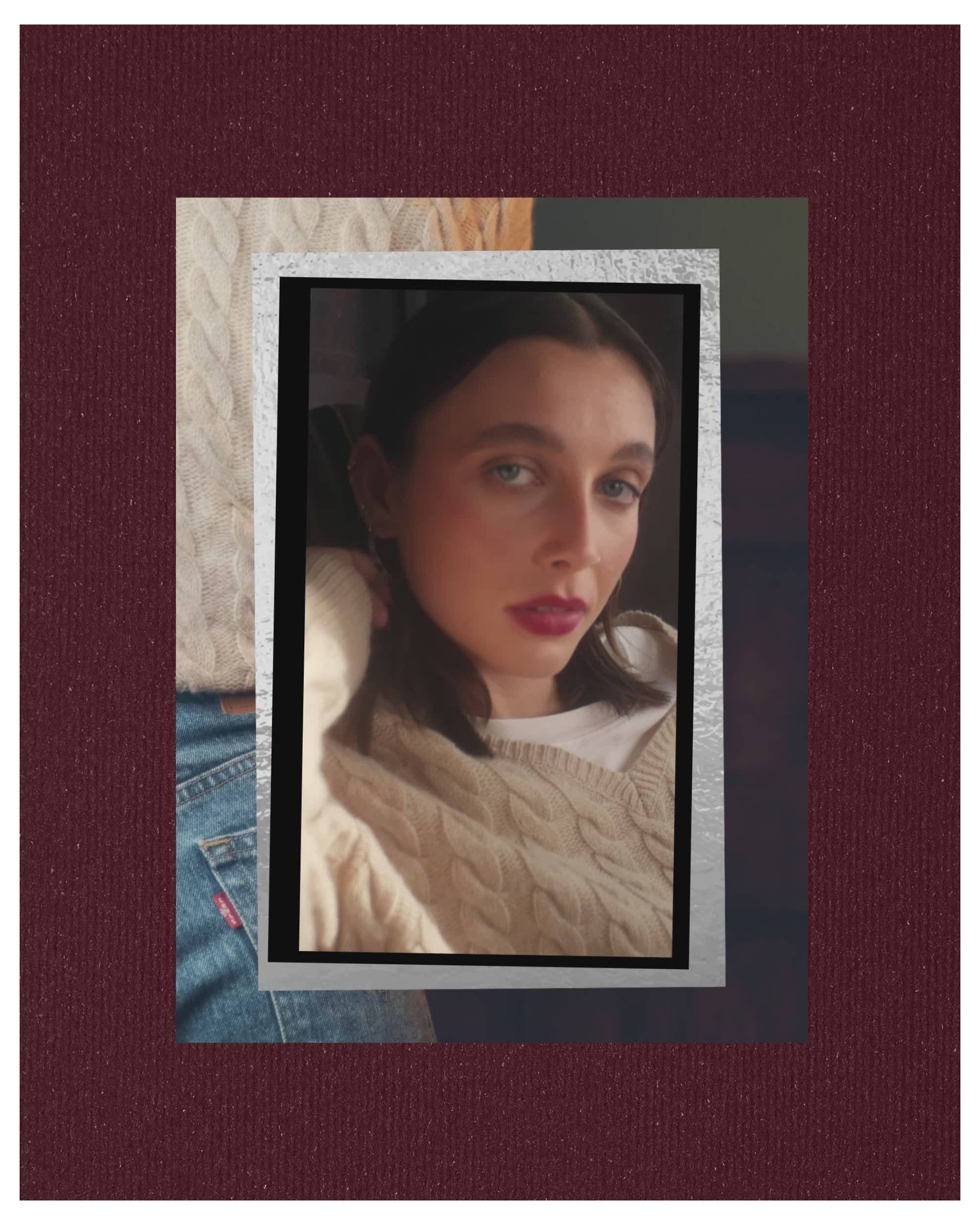 Deep maroon toned glitter plate with video collage of Emma Chamberlain overlaid in a cream knit sweater and Ribcage Bells jeans