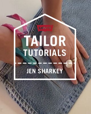 raw hem cut on denim jeans close up