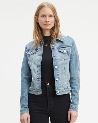 Model wearing mint green sherpa trucker jacket