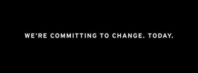 White text on top of a solid black banner with the text "WE'RE COMMITTING TO CHANGE. TODAY." written out.