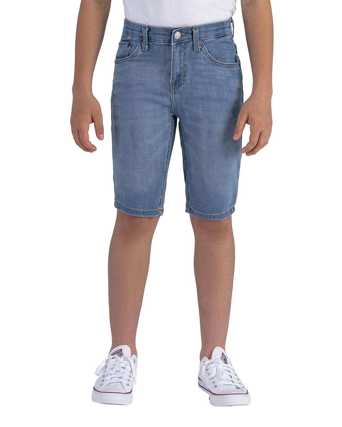 Boy wearing slim knee length shorts