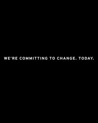 White text on top of a solid black banner with the text "WE'RE COMMITTING TO CHANGE. TODAY." written out.