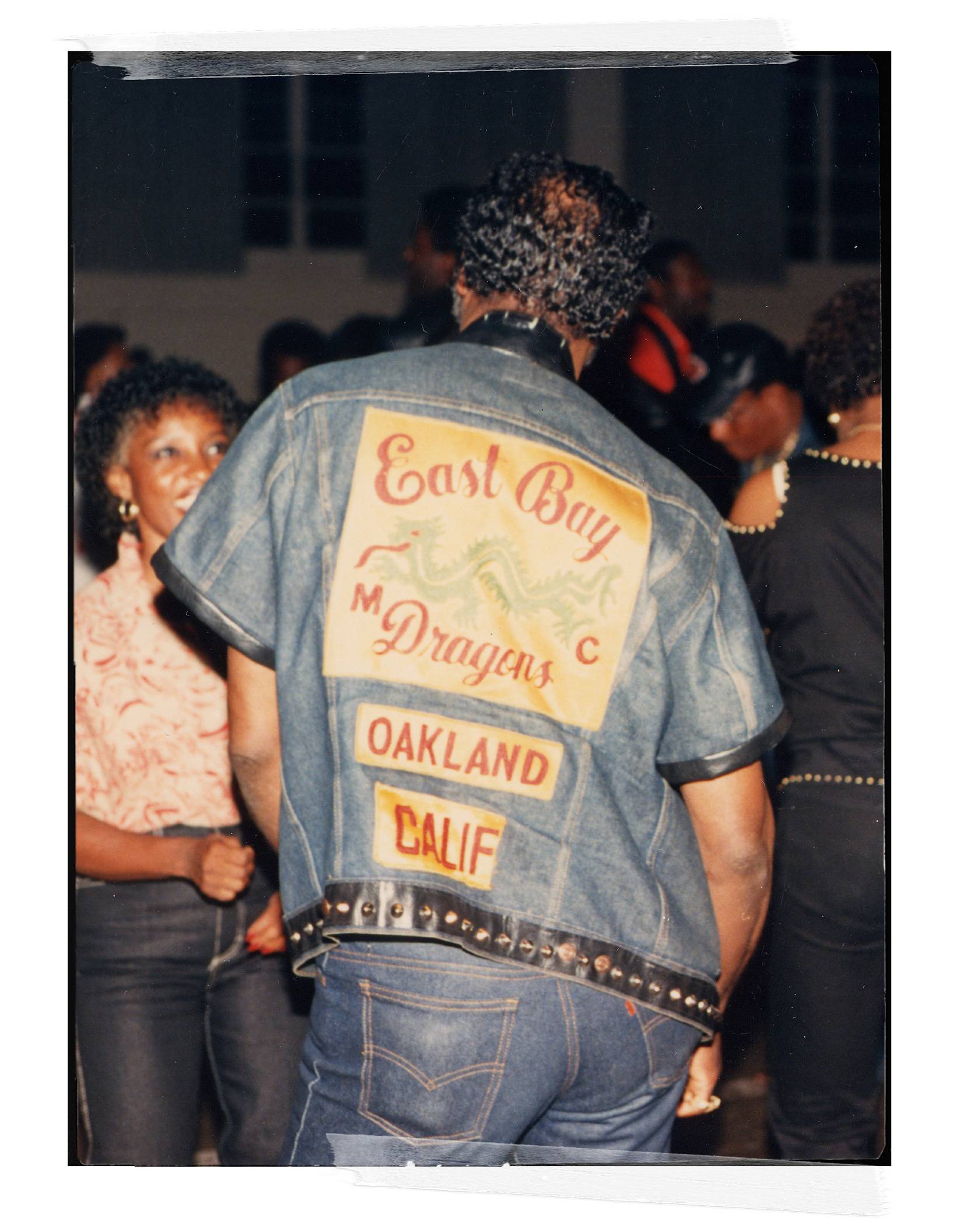 Man wearing an East Bay Dragons customized Levi's denim top with Levi's jeans on.