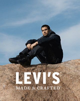 A GIF with the first image of a woman wearing a long Levi's Made & Crafted denim sherpa jacket standing in front of a grassy mountain and the second image of a man sitting on a boulder wearing black denim jeans and black jacket, bordered by texture from nature.