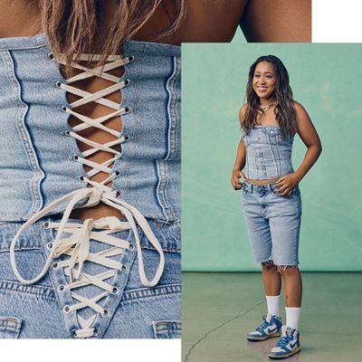 Naomi Osaka modeling a corset type denim outfit.