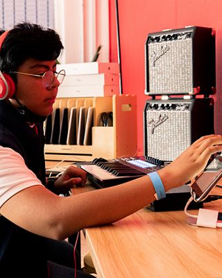 Man listening to music on their headphones.