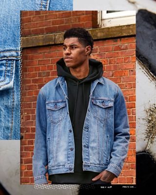 A portrait shot of Marcus Rashford wearing a Levi's Trucker Jacket