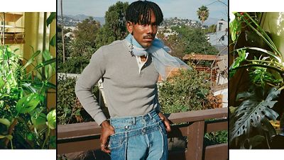 Portrait of Jerrod La Rue surrounded by plants.
