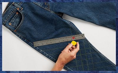 pair of jeans with ruler