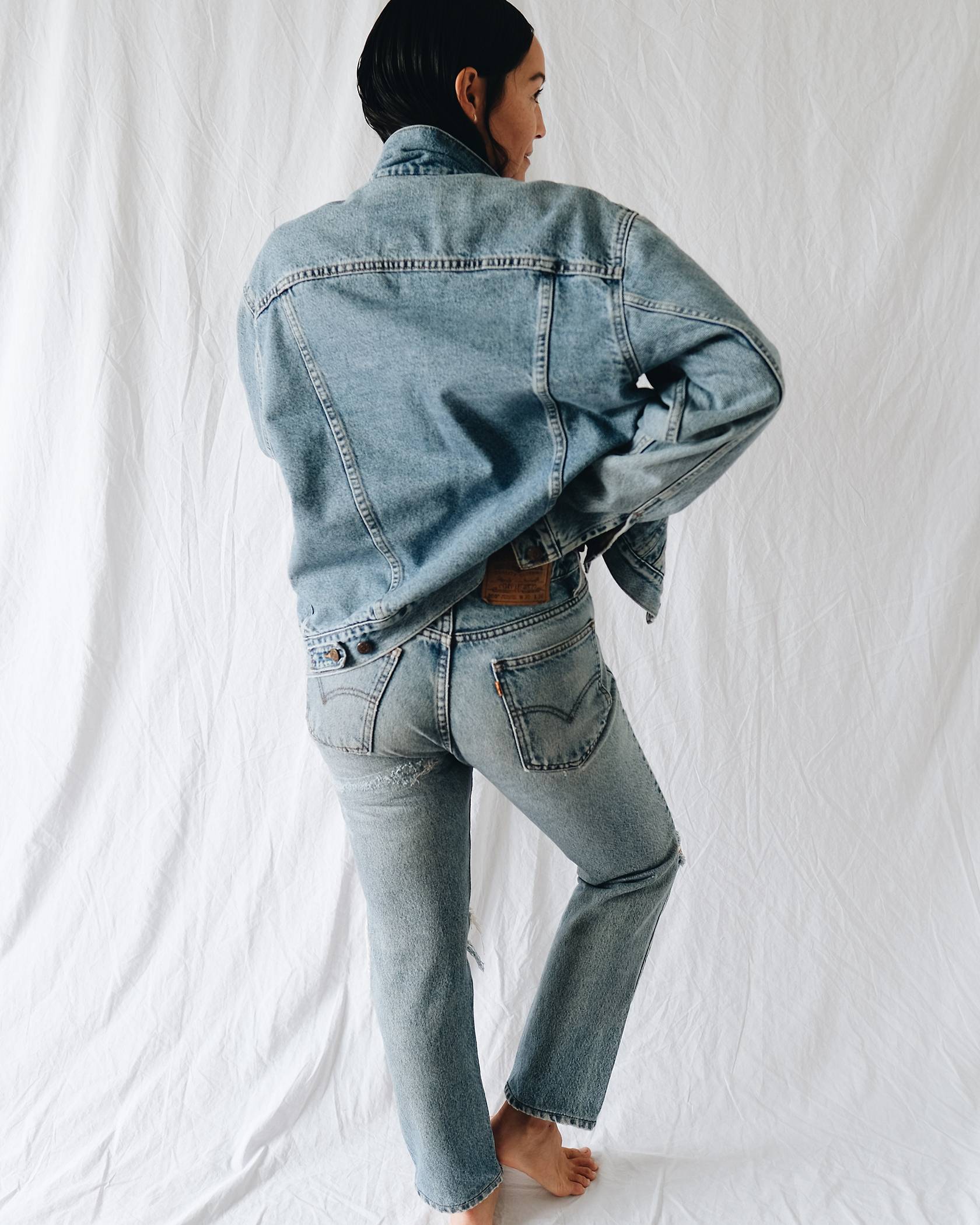 Portrait of Rachael Wang wearing Levi's® Trucker Jacket and vintage 505 jeans.