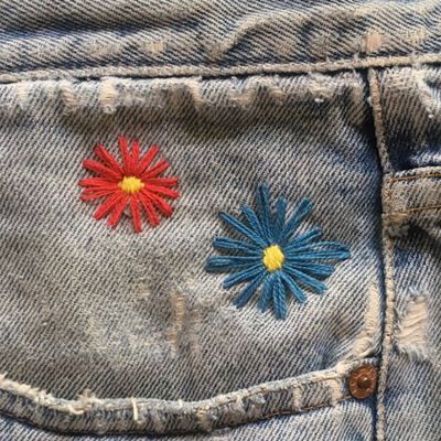 floral design on denim embroidery