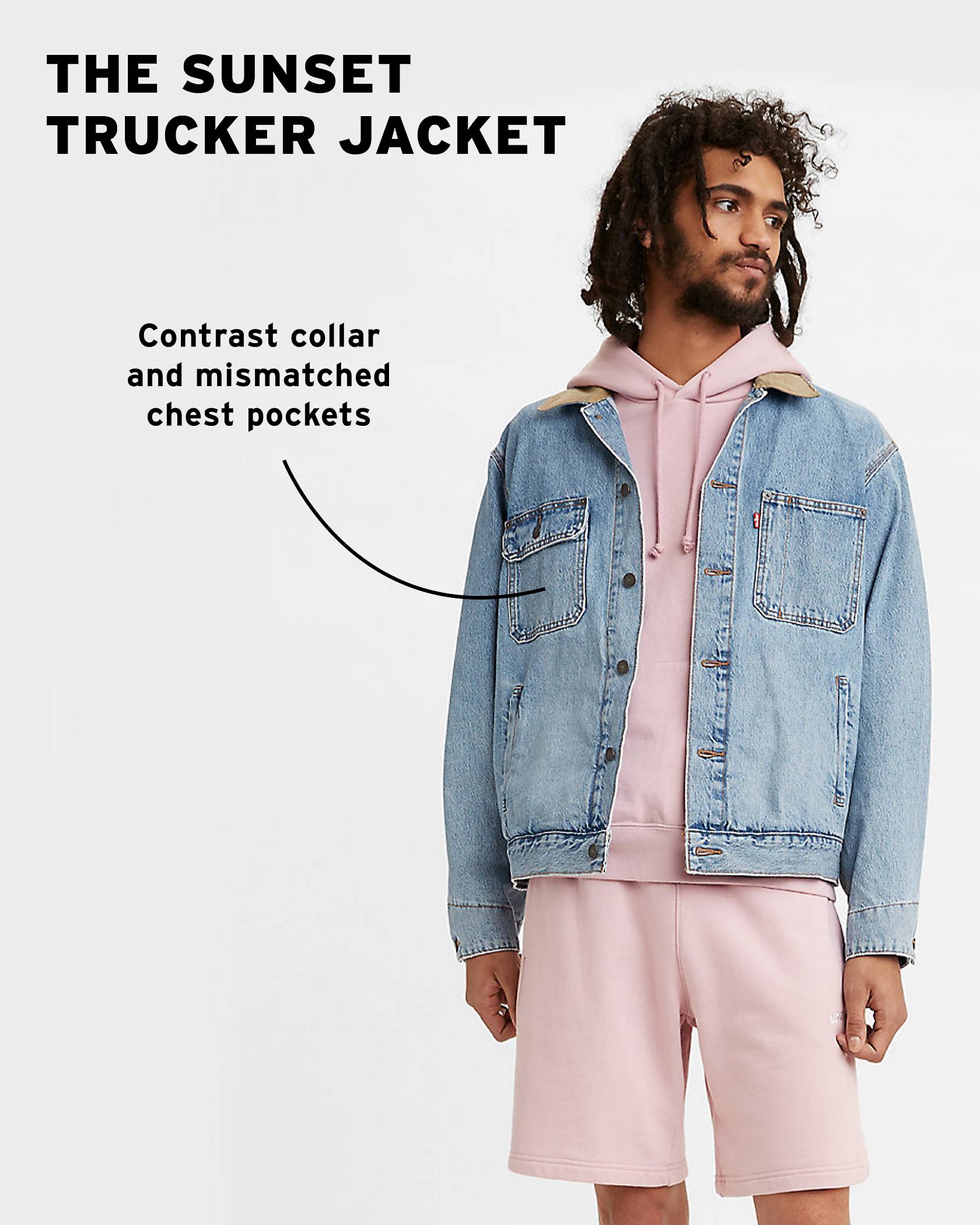 Model wearing Sunset Trucker jacket with copy: "Contrast collar and mismatched chest pockets"