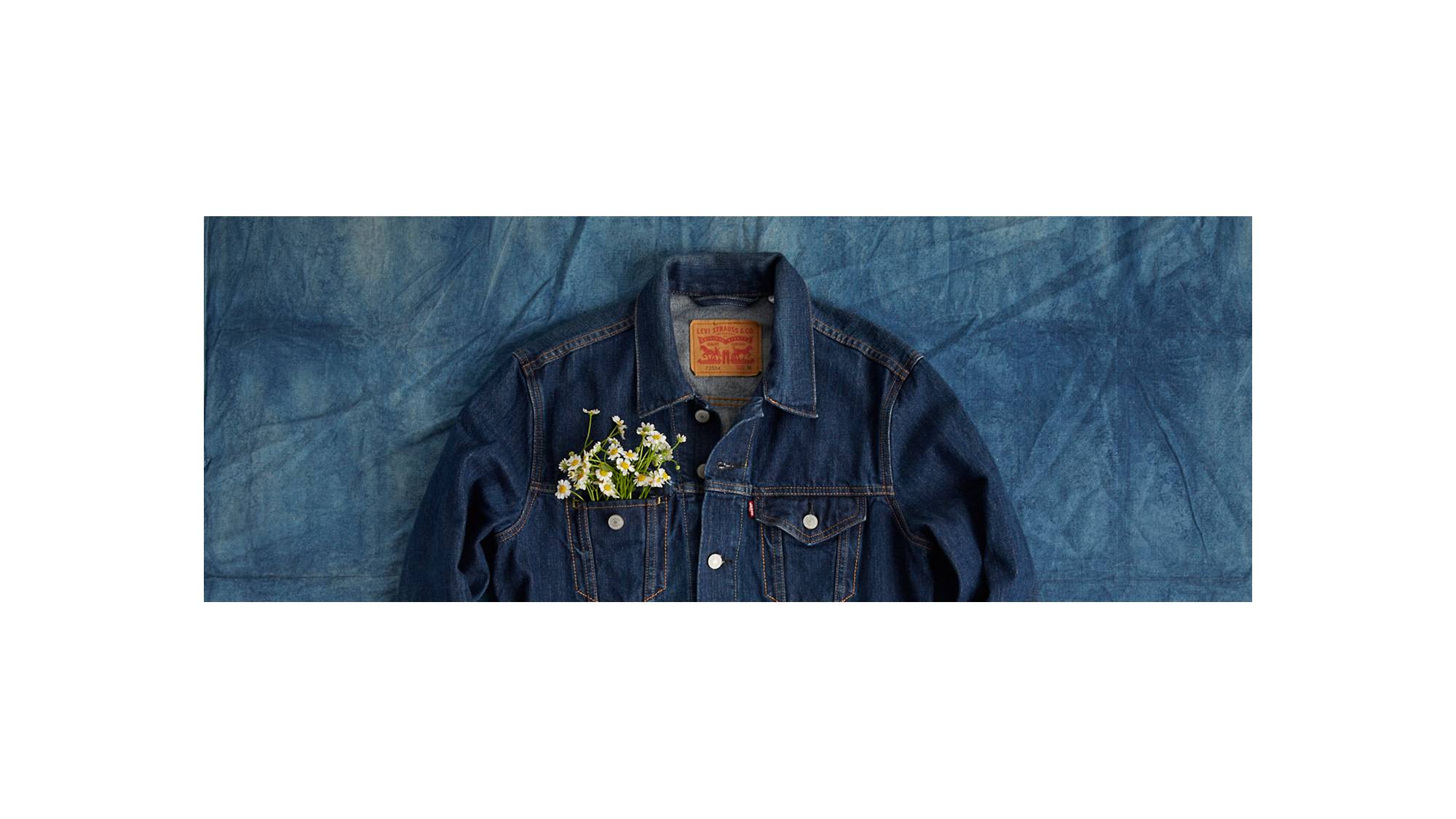 denim jacket with flower in pocket