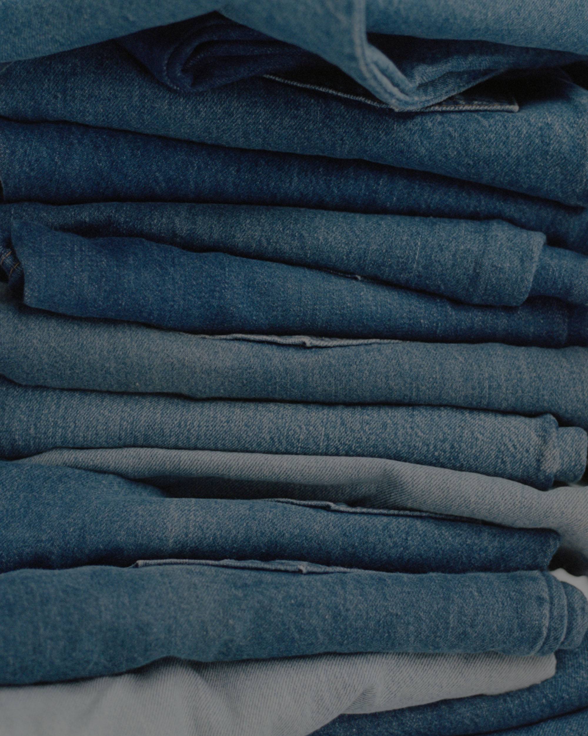 Stack of denim in different washes