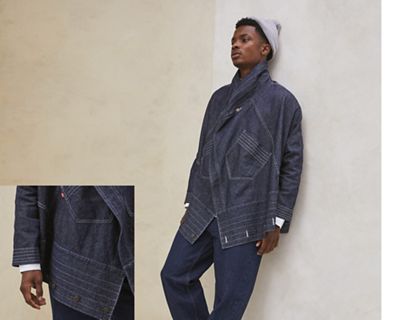 Two images of the Levi's® Upside-Downable Trucker Jacket. The image on the left is a close-up shot of the details of the jacket around the wrist and the image on the right is of a model in the jacket, leaning their back against a wall.