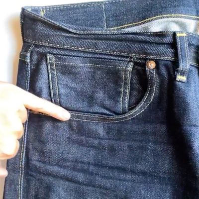 A lockstitch on the pocket of jeans