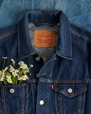 denim jacket with flower in pocket