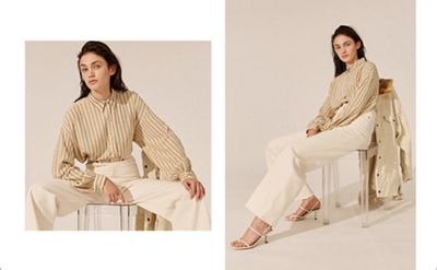 woman wearing button up shirt and white denim jeans