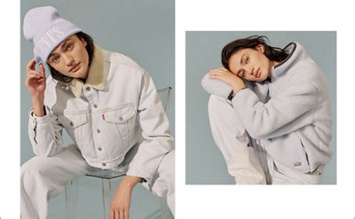 woman wearing denim jacket annd jeans and winter hat