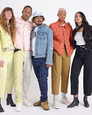 group of people in colored outfits