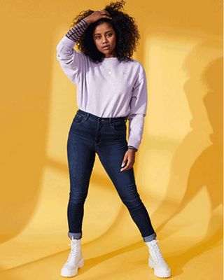 Video of the three models featured in the same outerwear (one is a pink sweatshirt, another is a purple sweatshirt, and the other is a blue denim trucker jacket) and denim blue and black jeans.