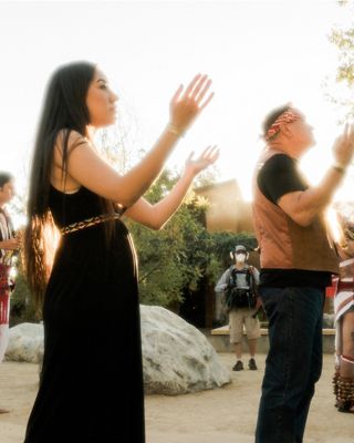 Xiuhtezcatl with friends and family participating  in their native culture rituals