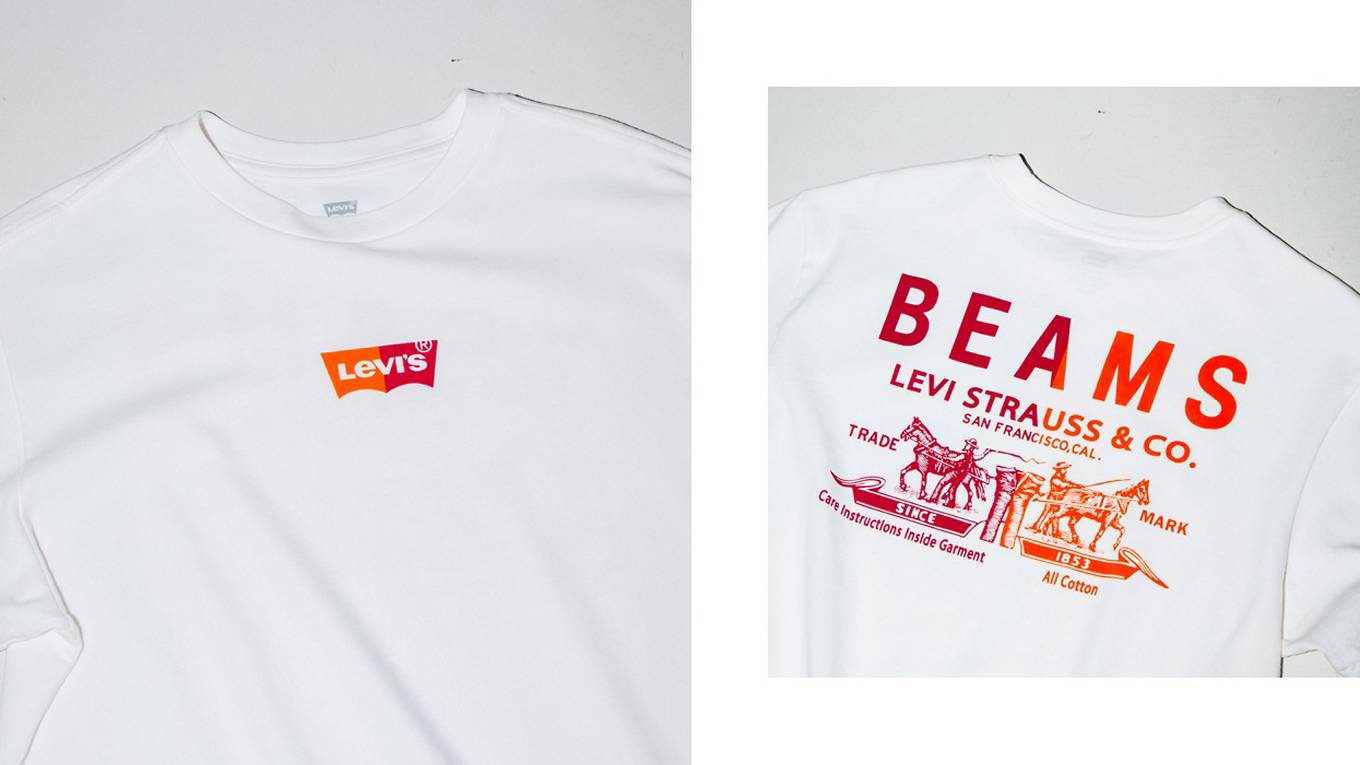 White tee shirt of beams and a red/ orange logo