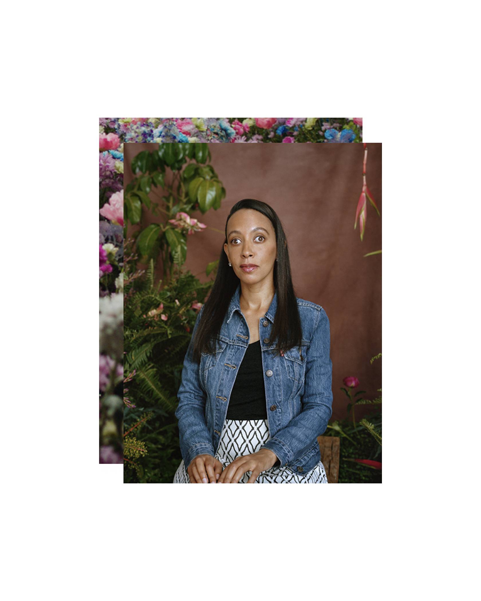 A portrait shot of Haben Girma wearing a jean jacket and white skirt