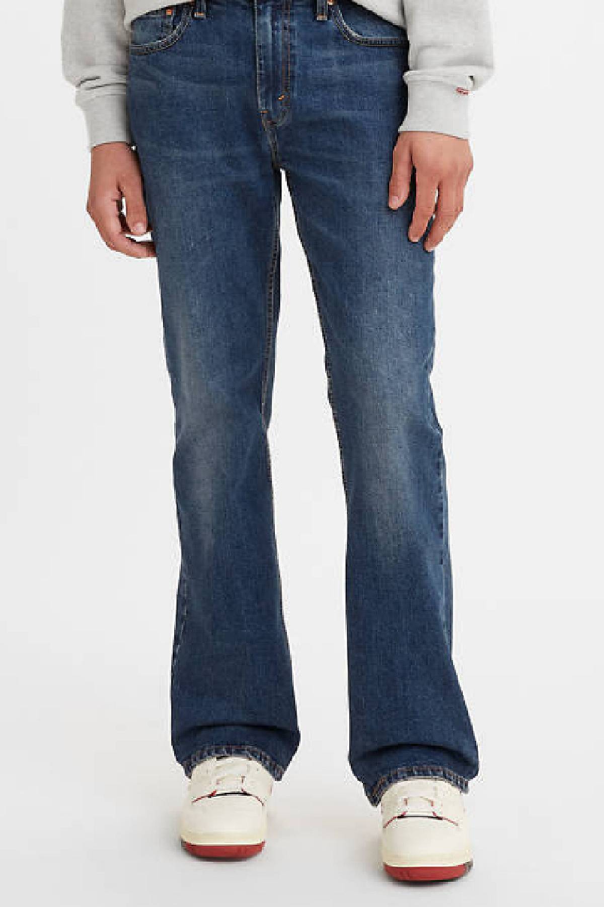 Model wearing 527™ Slim Bootcut jeans