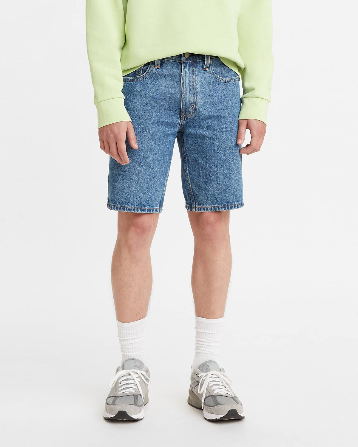 Model wearing jean shorts
