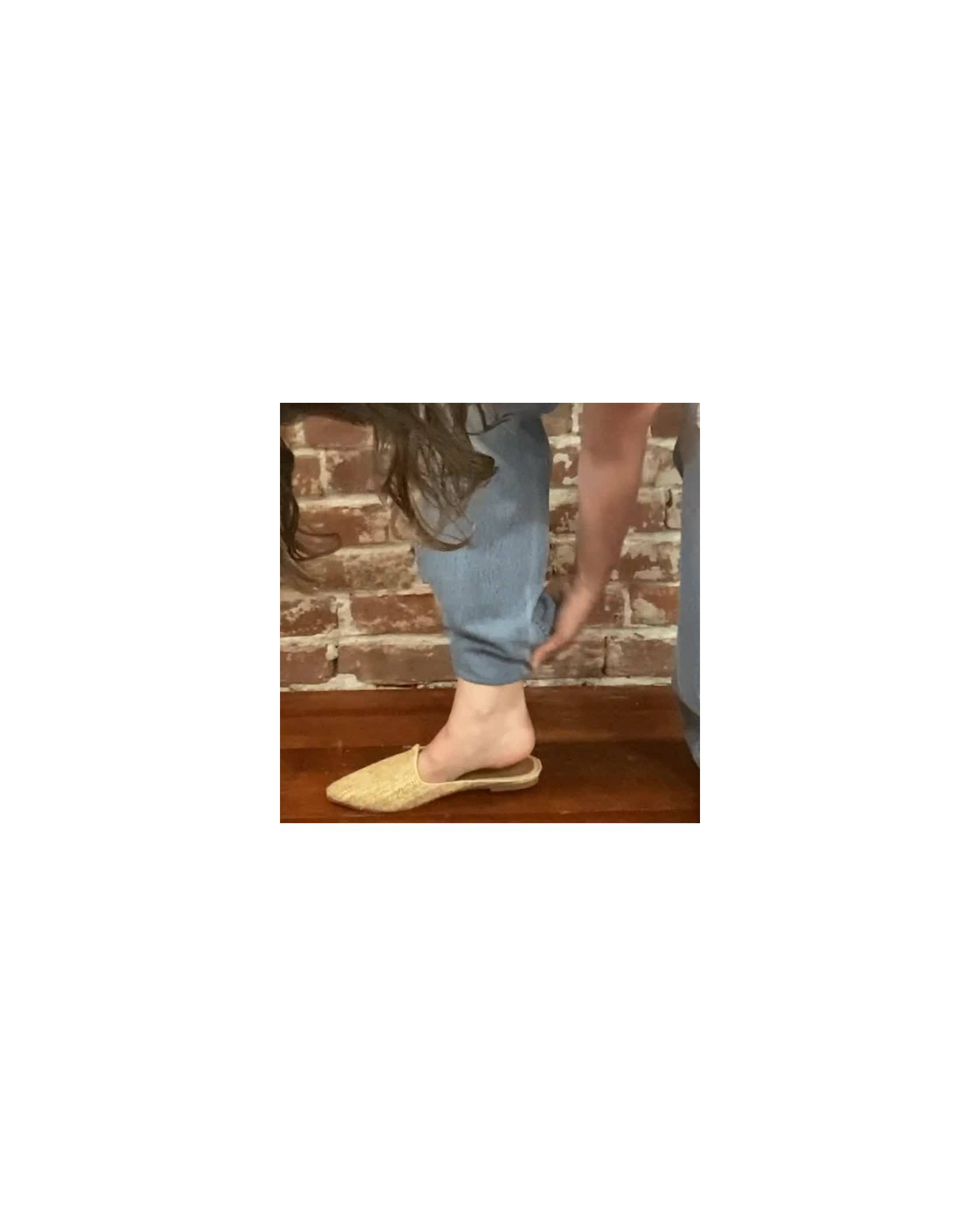 woman marking jeans gif with shoes on