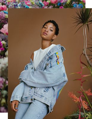 Willow Smith wearing a jean jacket and light wash jeans