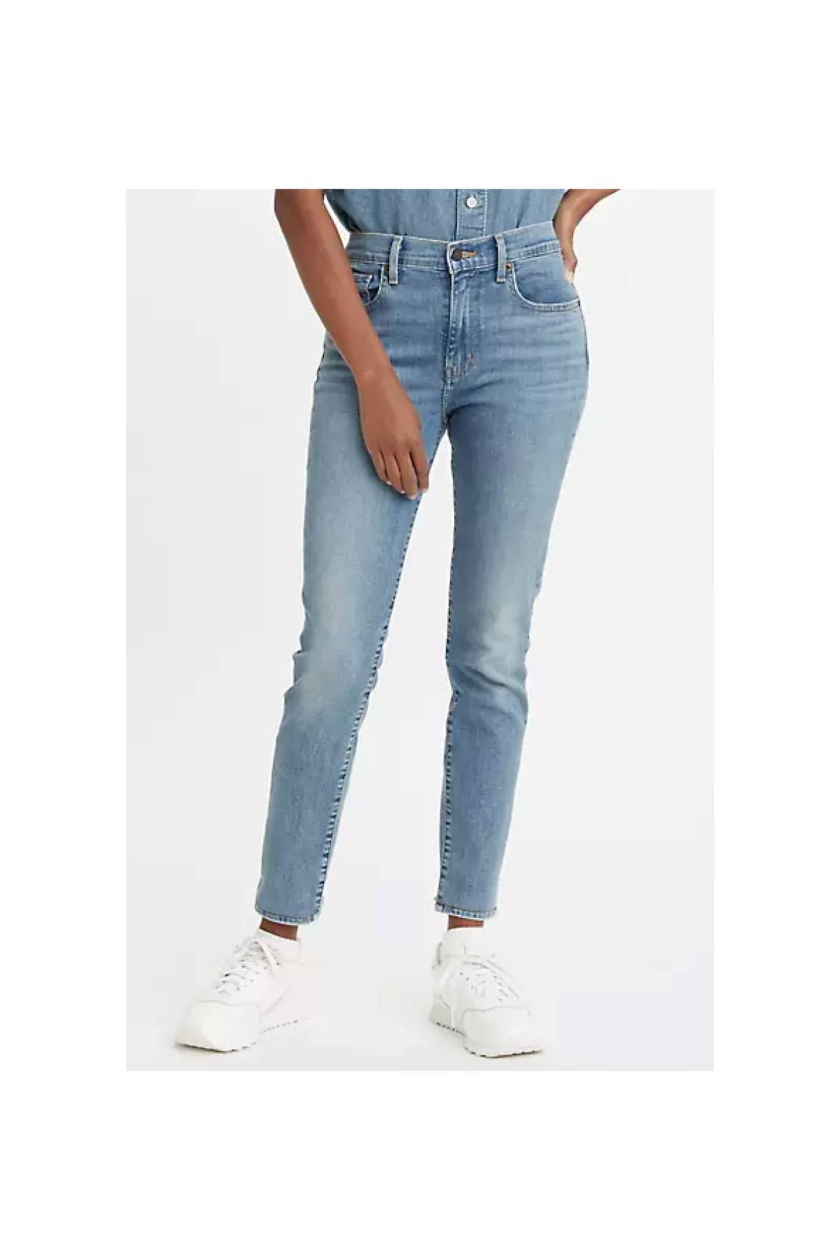 Model wearing 721 high-rise skinny jeans