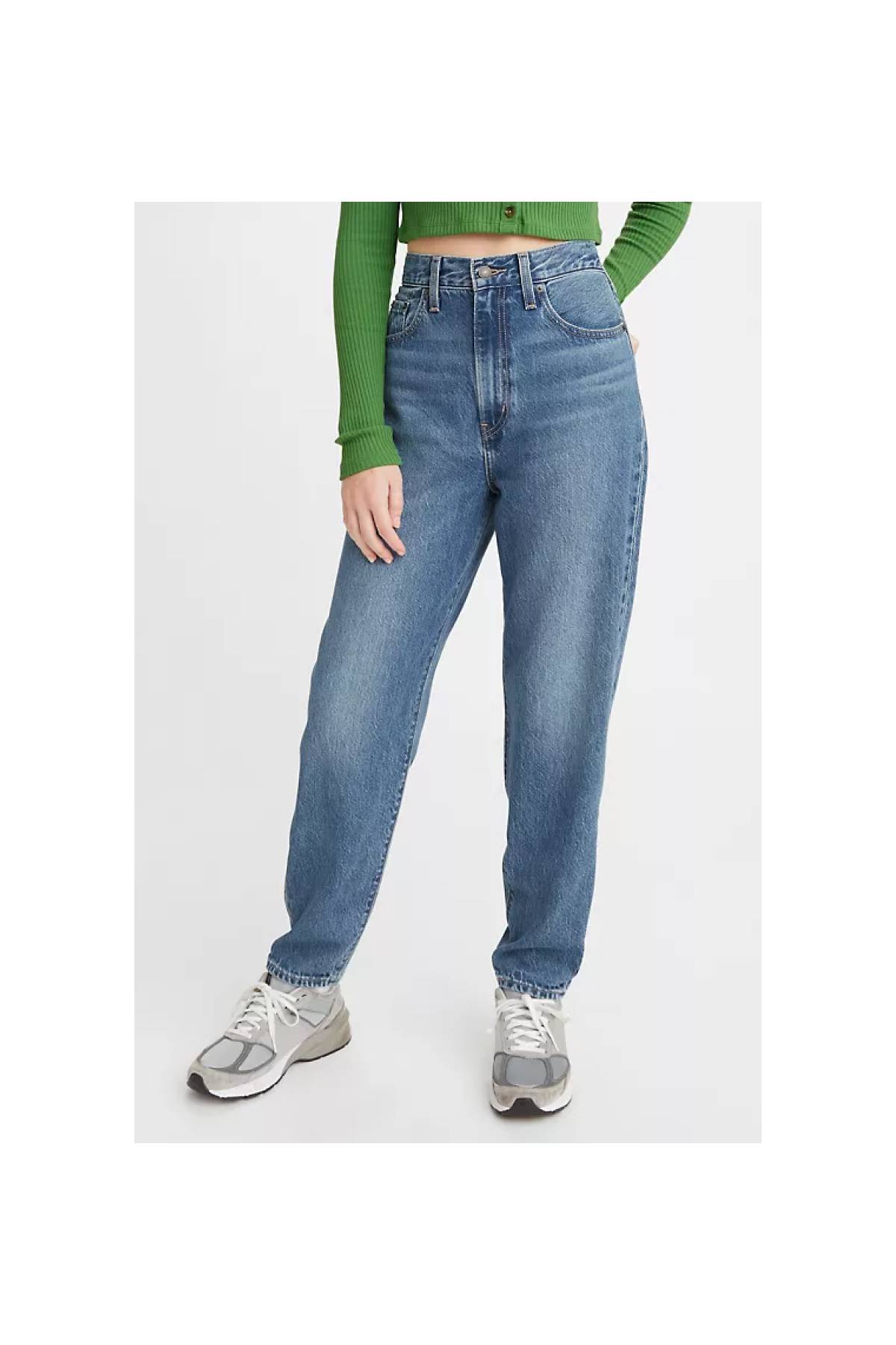model wearing high loose taper jeans