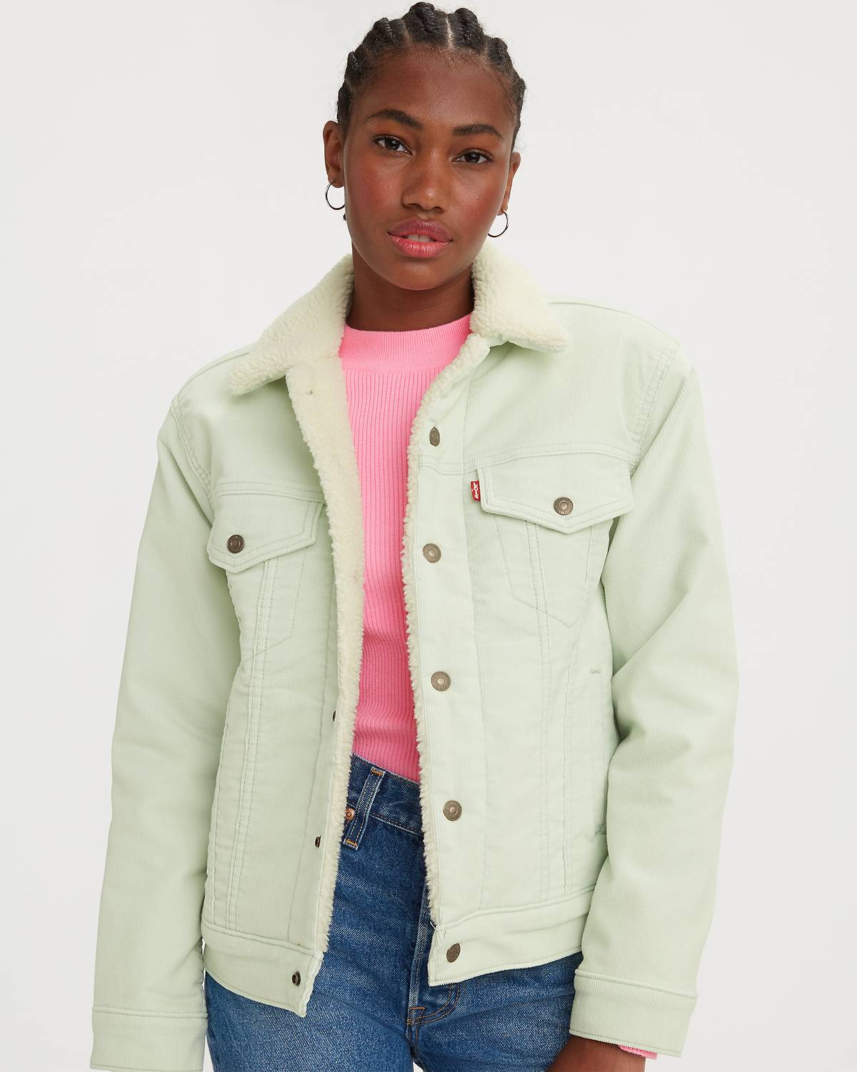 Model wearing mint green sherpa trucker jacket