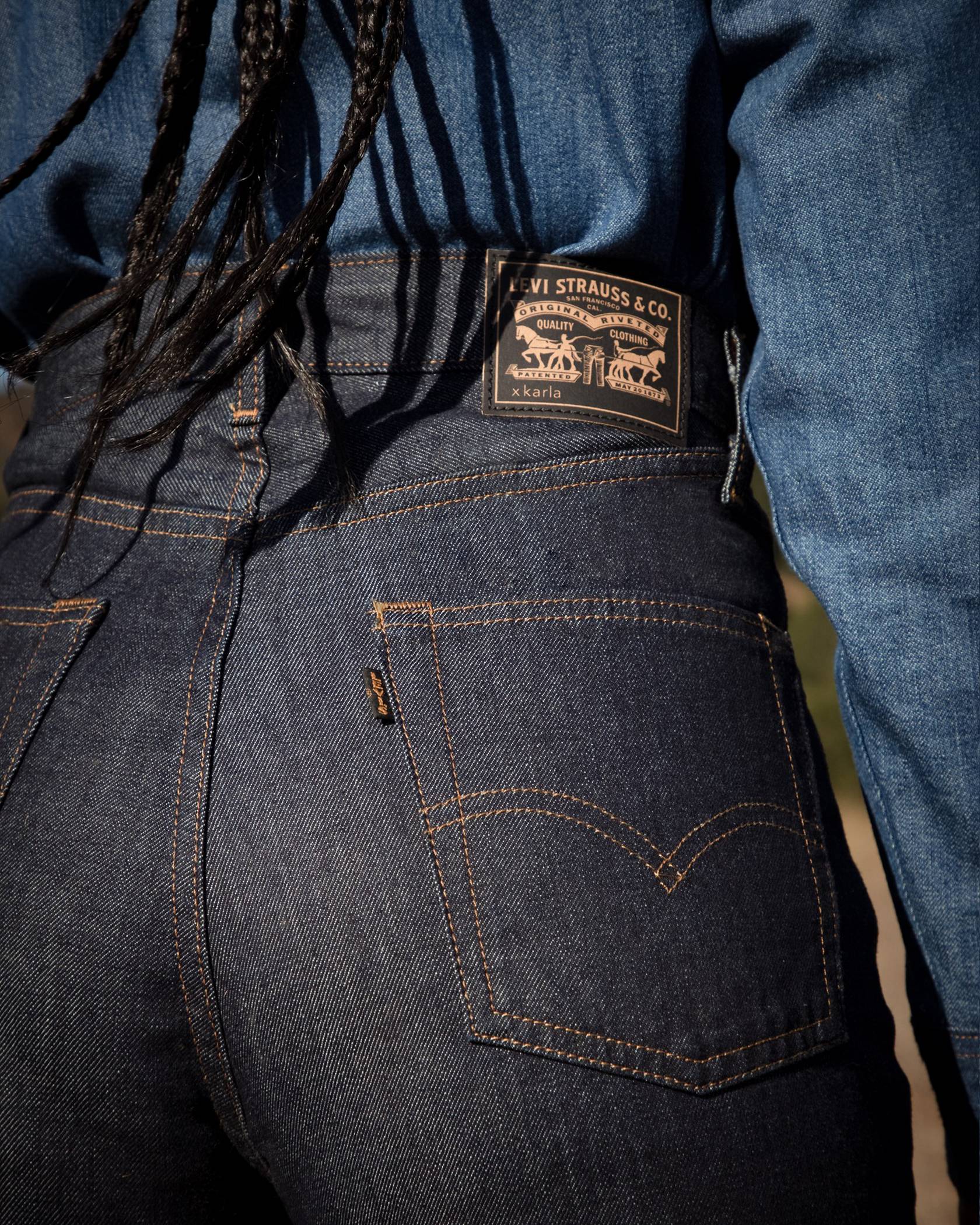 Close up butt shot of xKarla wearing dark denim jeans.